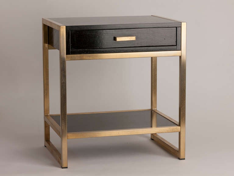 Lovely pair of ebonized oak and bronze side tables with drawer and shelf