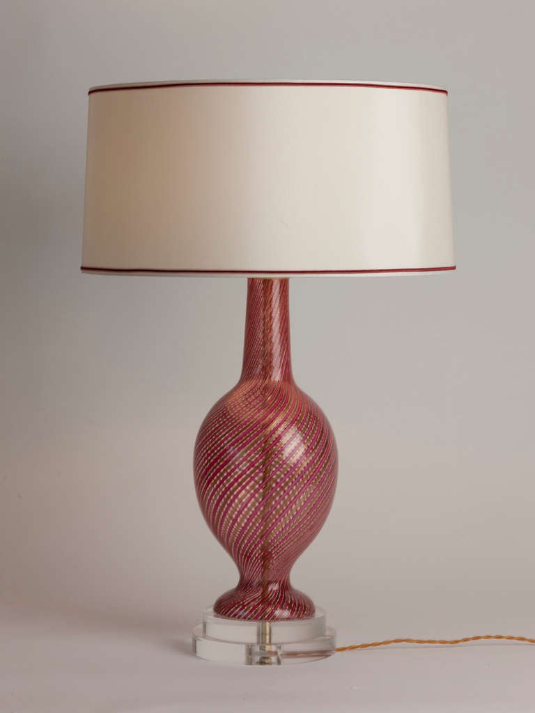 Vintage Murano lamp featuring fuschia and copper swirl detail. Custom silk shade with coordinating trim made in Paris.