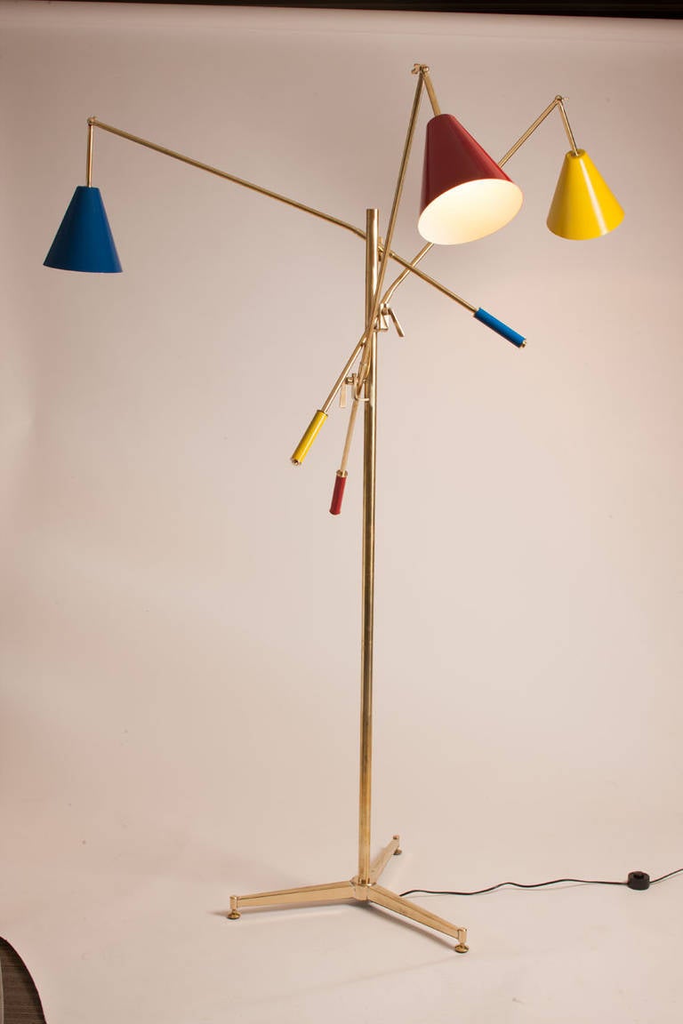 Dating from the 1970's this rendition of the iconic 1950's Triennale features three adjustable arms in canary, red and cobalt.