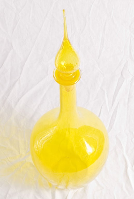 Vibrant yellow blown glass vessel