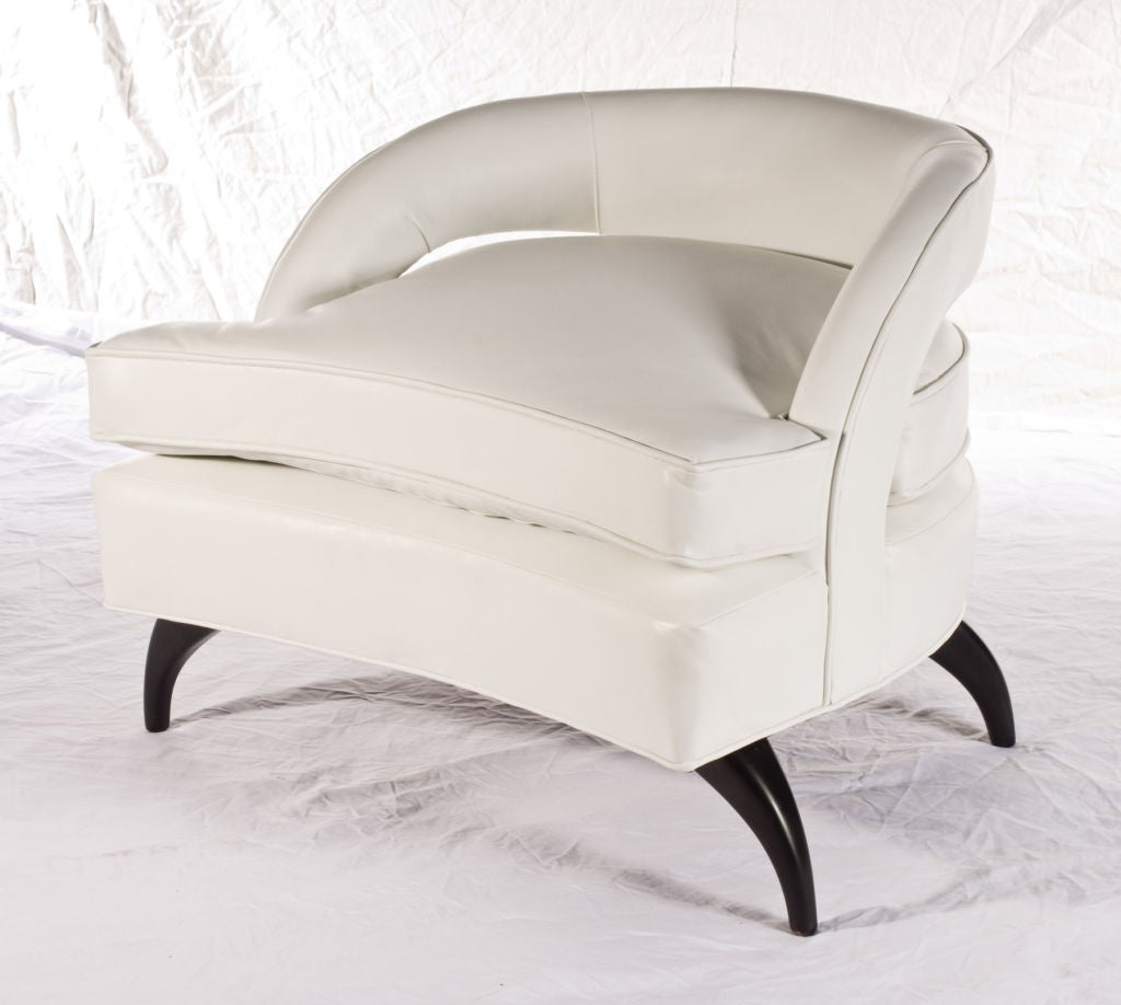Architectural mid century low back chair in white leather. In the manner of Vladimir Kagan.