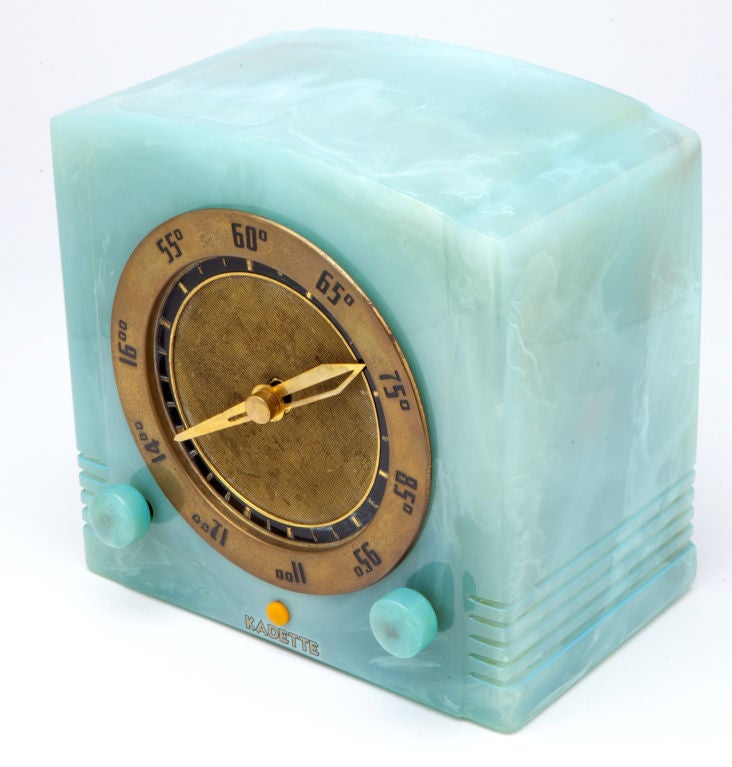 This incredible marbleized turquoise blue 1937 radio is made of catalin (a phenolic resin often incorrectly called Bakelite which is a brand name).  The radio was manufactured by the Kadette Radio Corporation, Ann Arbor, Michigan and is known as the