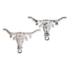 An Authentic Pair of Cast Iron Longhorn Steer Pulley Weights
