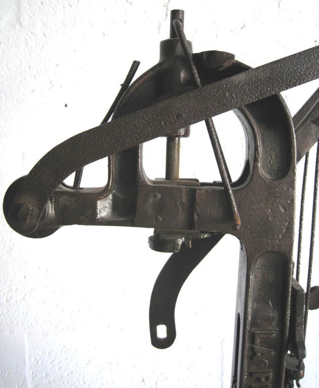 This nineteenth century French wine corker (or recorker) is constructed of cast and wrought iron. While looking like modern sculpture, the device is functional and operates with ease. The name of the manufacturer is cast on the vertical arm “ La