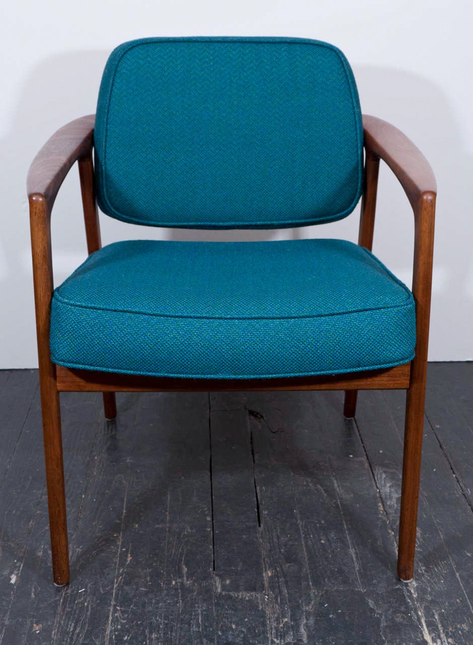 Very handsome pair of chairs with a nicely sculpted teak frame and newly reupholstered in a beautiful vintage fabric. Versatile size for lounge or client chairs. Please contact for location. Offered by Las Venus by Kenneth Clark, New York City.