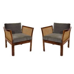 Pair of Rosewood and Cane Lounge Chairs by Illum Wikkelso