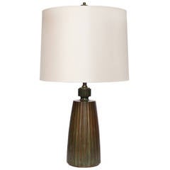 Scandinavian Art Deco patinated bronze lamp with fluted surface.