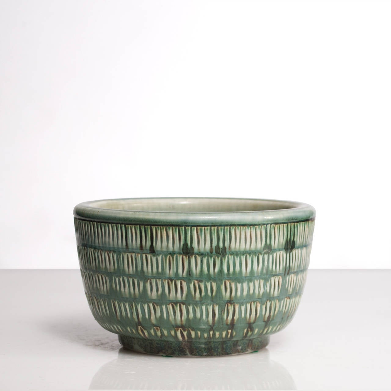 Art Deco Swedish art deco ceramic bowl by Gertrud Lonegren in green glaze.