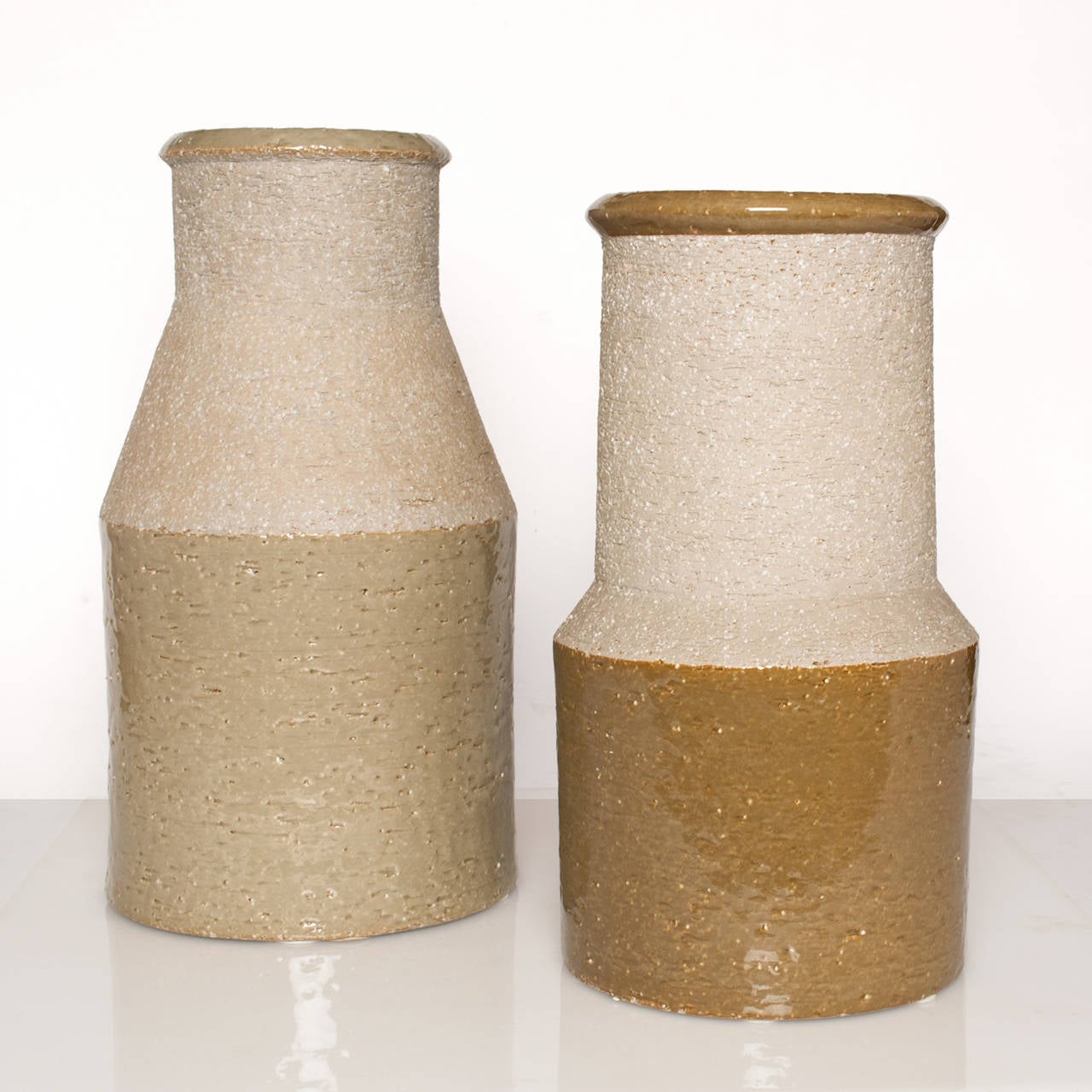 Large studio vases by Hertha Bengtsson for Rorstrand, Sweden. These vases use charmotte clay and were designed circa 1962.
 
H: 17