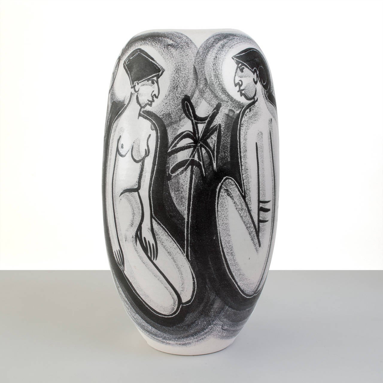 Mid-Century hand decorated ceramic vase by Danish artist Mette Doller on a form by Erik Ivarsson for the Swedish company Andersson & Johansson - Höganäs Ceramic, circa 1950's.  The vase artistically depicts four figures possibly Mayan wearing hats