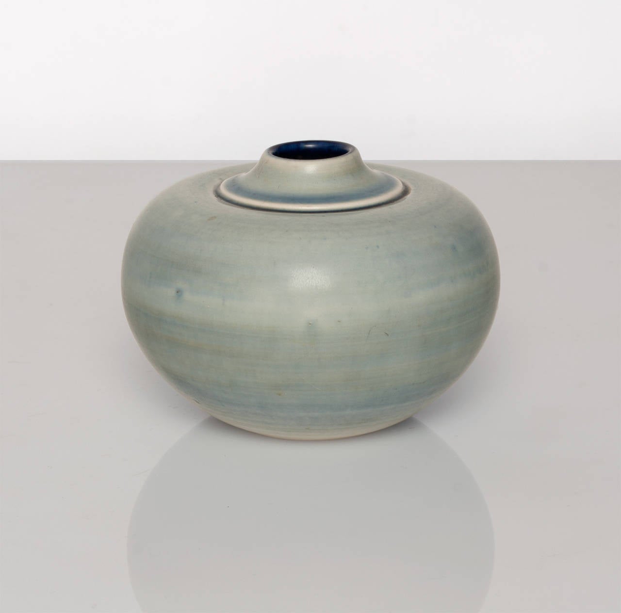 Unique Swedish art deco vase with warm blue and gray-green glaze. Made by Gertrud Lönegren at Rorstrand circa 1937-1942.
Diameter: 5