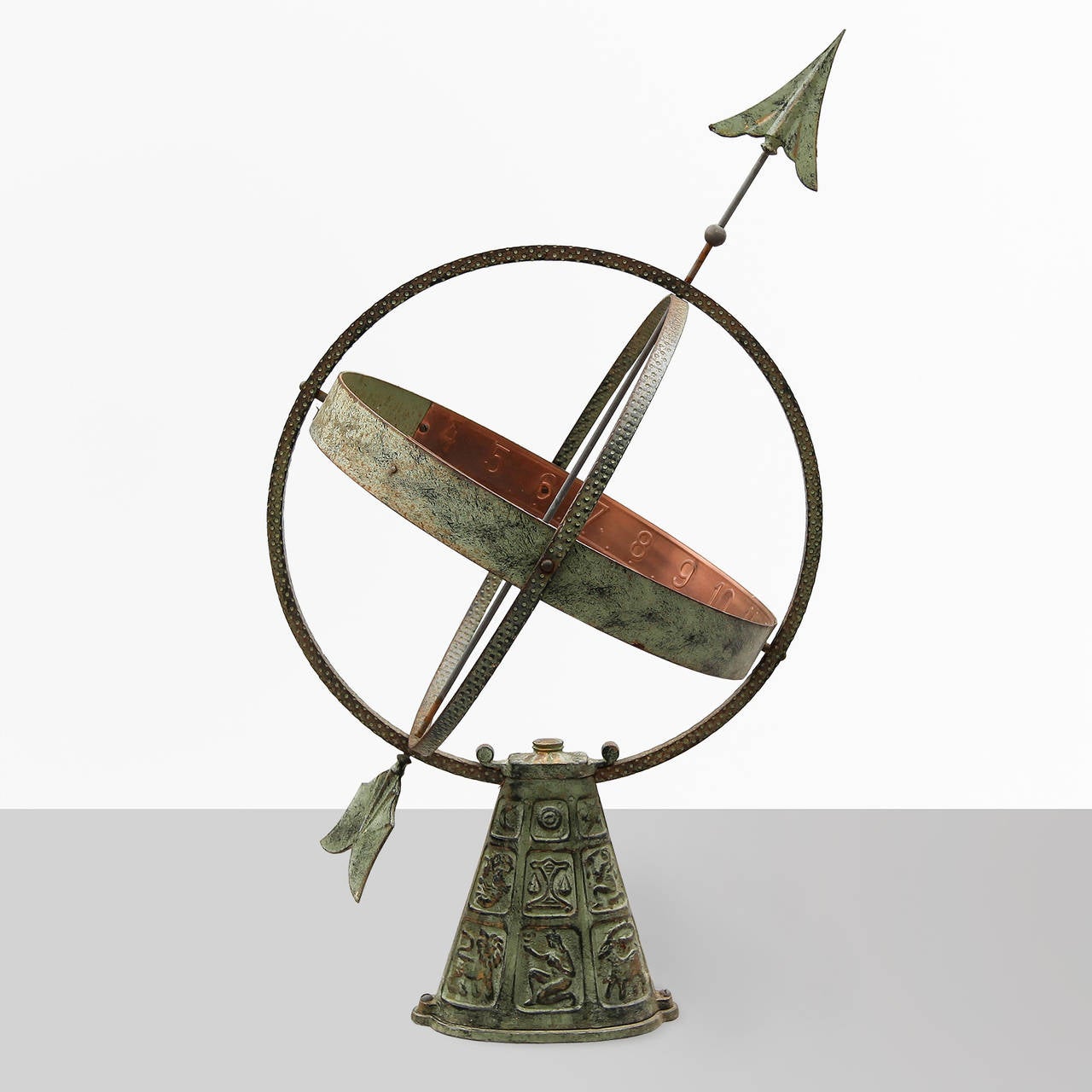 Swedish metal sundial with with copper and painted details and a base with characters from the zodiac. Made circa 1940's.
 
Height 32