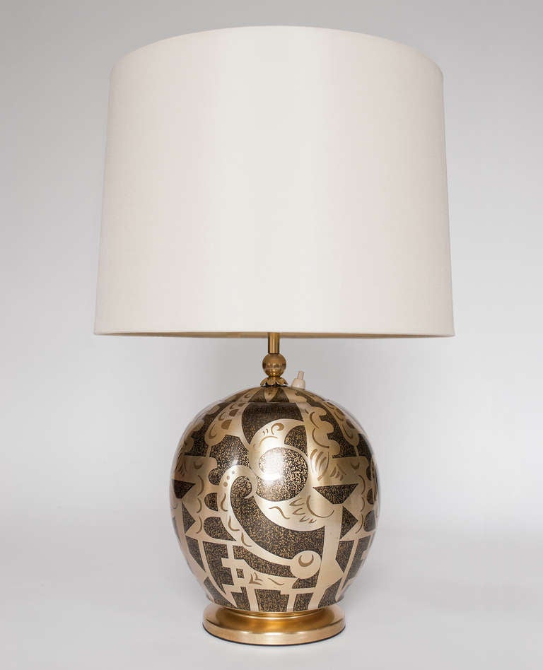 An Art Deco silvered and patinated brass and ivory Ikora covered jar lamp (model no. 110/216, circa 1929). Designed by Paul Haustein for WMF, Germany. Total height: 22 inches, diameter: 9