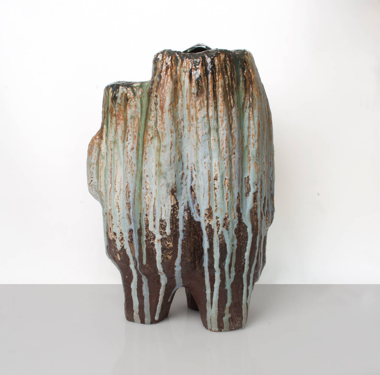 A monumental ceramic vase with a brown body on 3 points with a series of drip glazes by artist Helmut Friedrich Schäffenacker (1921 - 2010) whose workshop was located in Ulm, Germany, height: 20 