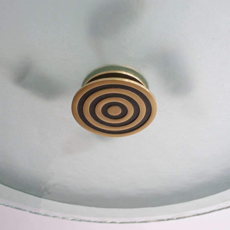20th Century Swedish Art Deco pendant of patinated and polished brass from Bohlmarks.