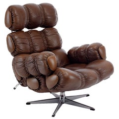 Brown leather lounge chair with swivel base 1970