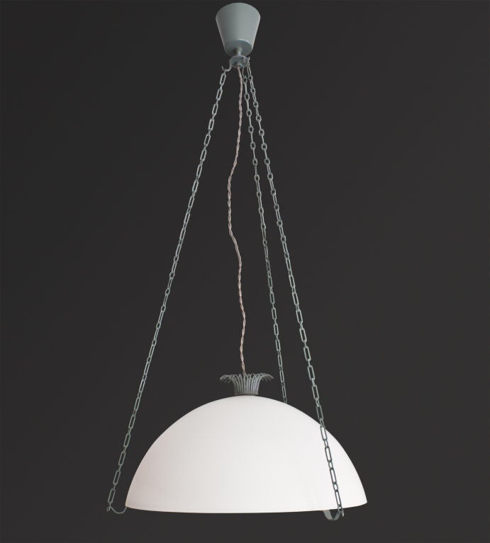 Elegant Swedish Grace, Art Deco “Parachute” ceiling light, designed 1925 by Erik Gunnar Asplund. The fixture has a half sphere of frosted glass topped with a painted metal crown supported by a painted metal ring suspended by three chains. One