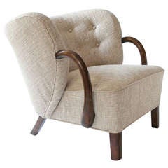 Danish Art Deco upholstered armchair with stained oak details, attrib. Viggo Boesen