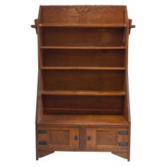 Carved oak Arts & Crafts bookcase with cabinet, Sweden. 1900