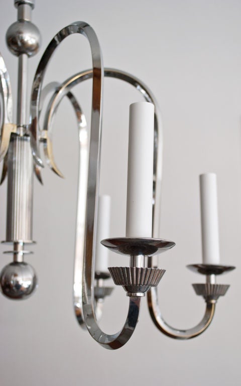 20th Century Graceful Danish Art Deco chromed brass 6-arm chandelier.