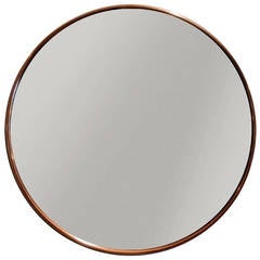 Swedish art deco mirror with polished copper frame.