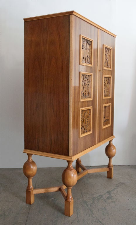 20th Century Swedish Art Deco 2-door cabinet with carved panels Eugen Hoglund