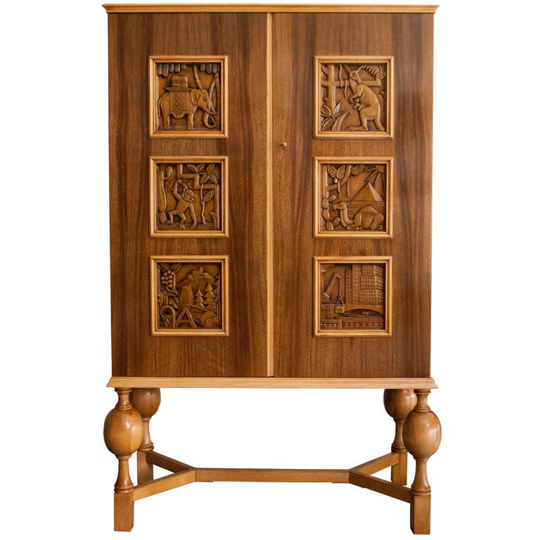 Swedish Art Deco 2-door cabinet with carved panels Eugen Hoglund