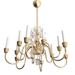 Exuberant Swedish art deco 12-arm brass and crystal chandelier