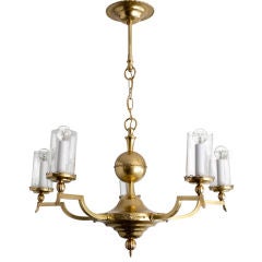 Swedish Art Deco 5-arm brass chandelier with crystal shades.