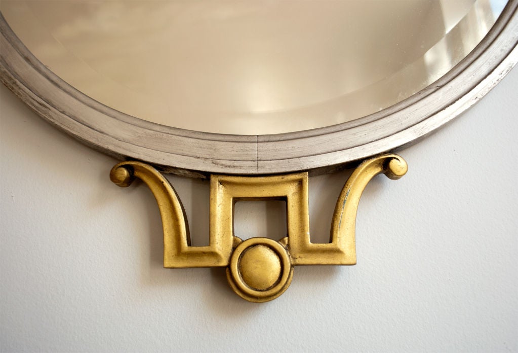 20th Century Elegant 1920 Swedish Art Deco gilt and silver oval wood mirror.