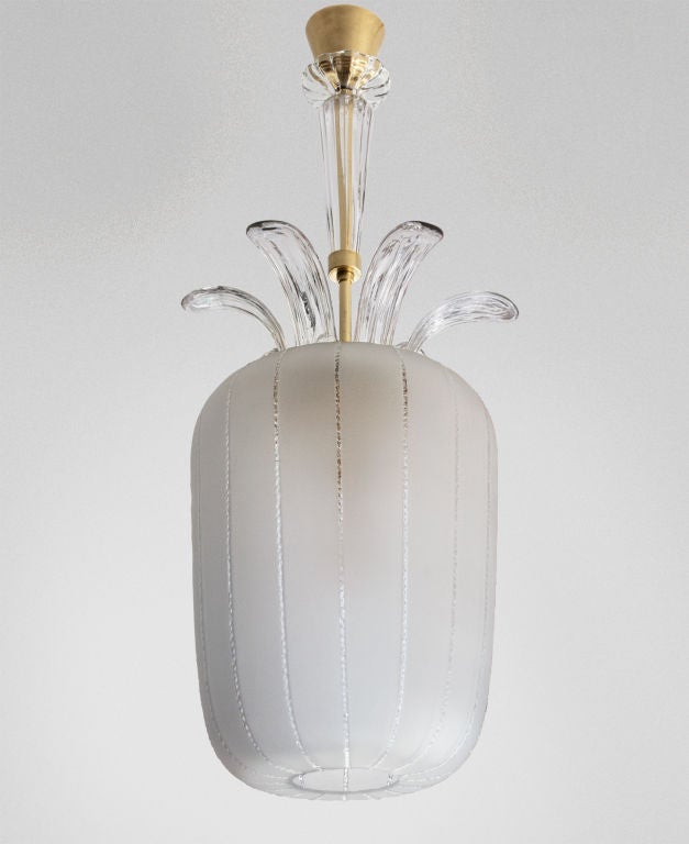 Exceptional, Swedish art deco ceiling fixture designed and signed by Edward Hald for Orrefors. The body is acid etched and features finely detailed raised stripes. A group of 6 arched petals crown the top. A brass stem is covered by a crystal stem.