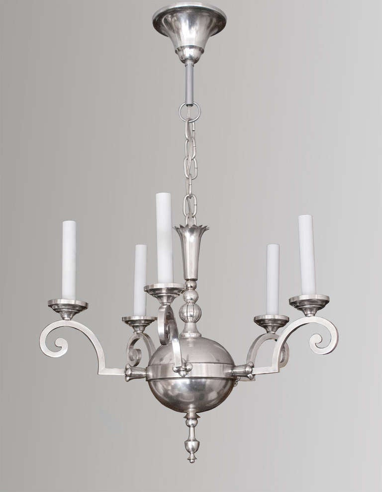 An elegant Swedish silver plated 5-arm Art Deco chandelier design attributed to Elis Bergh for C. G. Hallberg, Stockholm circa 1920's. Newly polished and lacquered, newly electrified for the USA with candelabra sockets. Diameter: 19