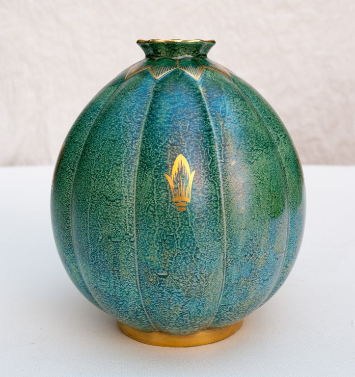 Swedish Art Deco hand decorated ceramic vase from Gustavsberg. Designed and signed by Josef Ekberg, 1937, in a blue-green luster glaze with details in gold.  Height: 9