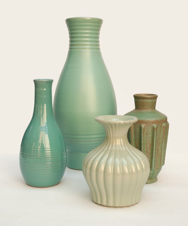 Assorted Swedish art deco vases by artist Ewald Dahlskog in a variety of green glazes produced at Bo Fajans. Dimension range 19