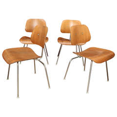 Set of Four Eames Molded Plywood DCM Dining Chairs