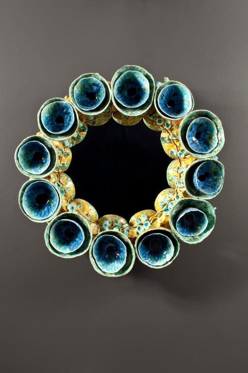 Rocaille turquoise and amber glazed pinch-pot convex mirror by Eve Kaplan. Custom order only.