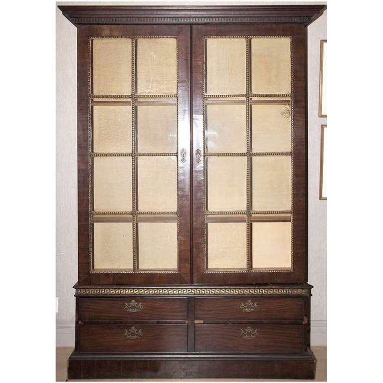 Pair of Georgian parcel gilt mahogany bookcases.