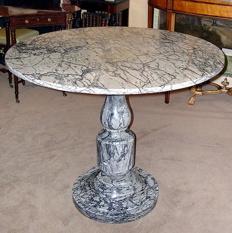 Neoclassical grey marble circular center table.