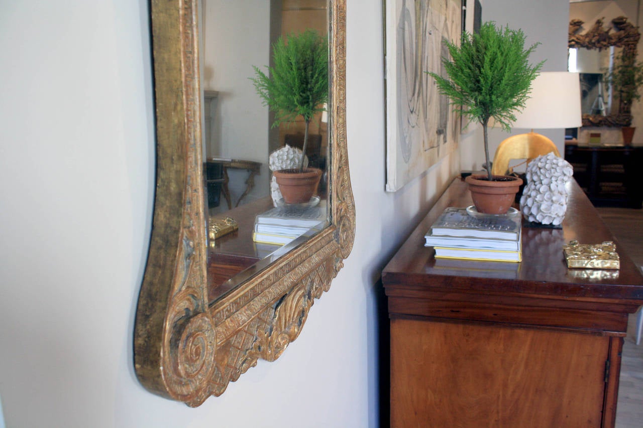 Original gilding mirror plate has been replaced, English, circa 1730.