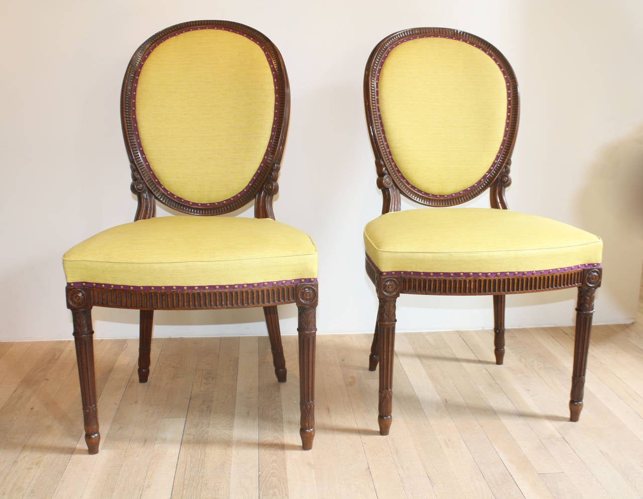 Set of six Adam side chairs, English, circa 1775
Reupholstered in yellow linen with aubergine trim.