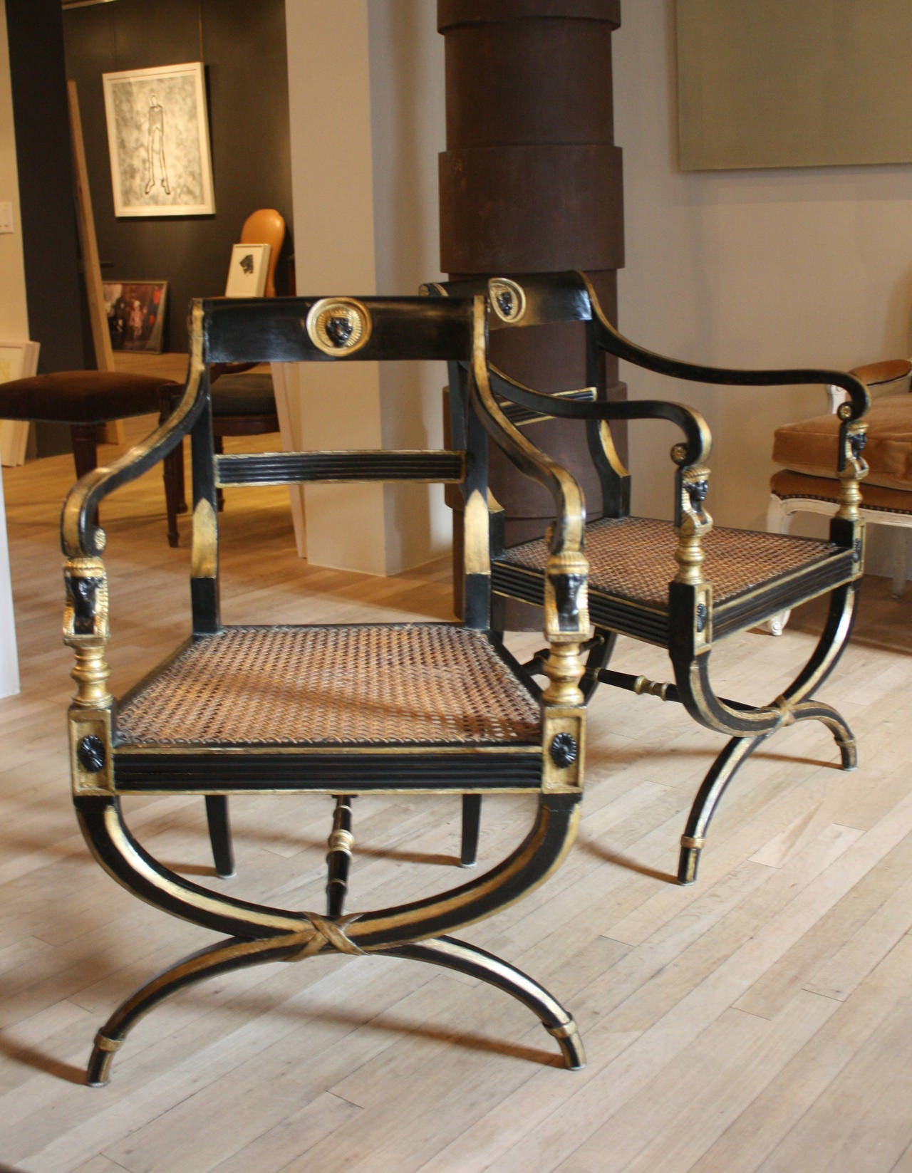 Pair of Regency Gilt Decorated and Ebonized Armchairs
