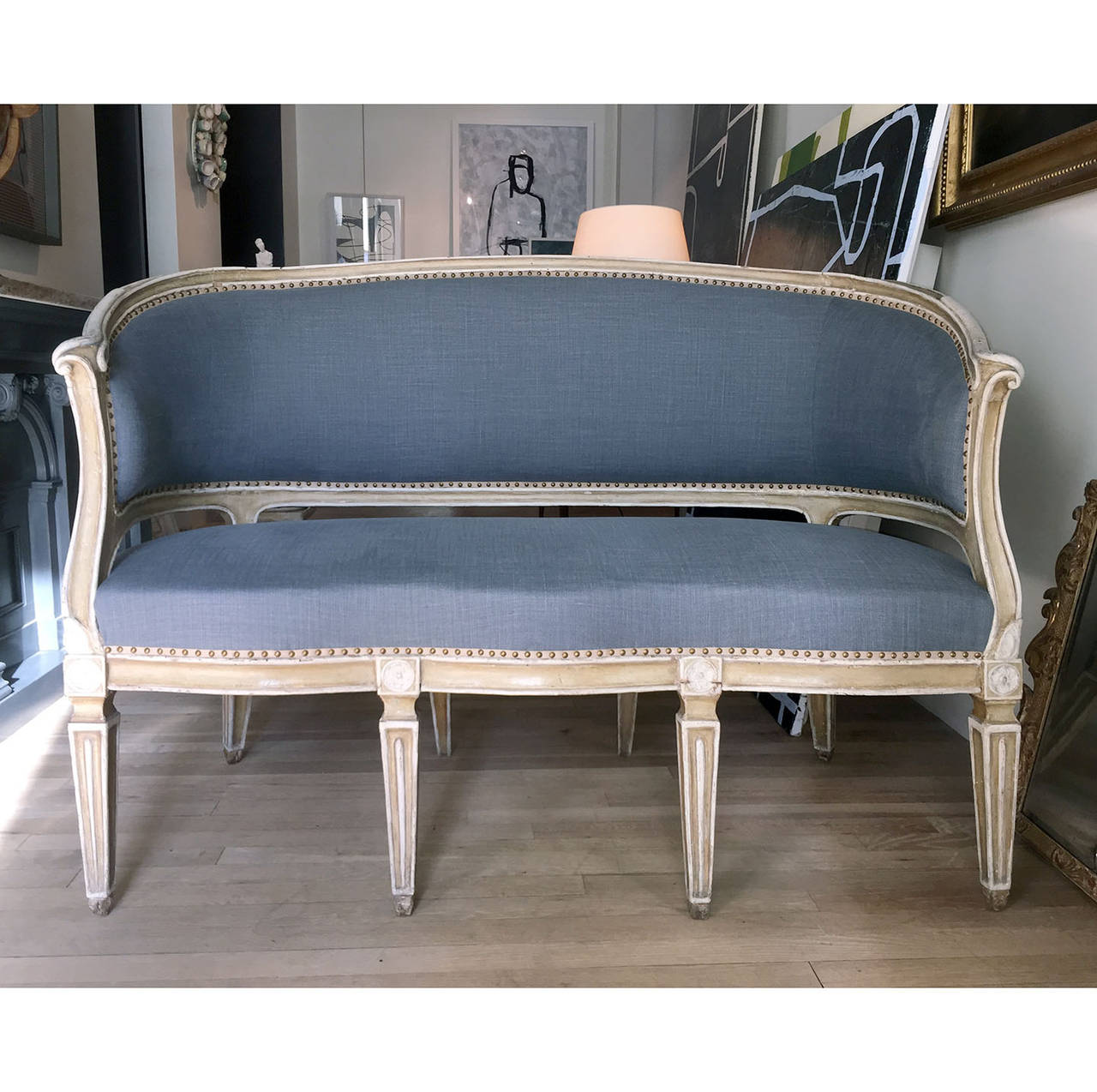 Louis XVI Painted Canape now with blue/grey linen upholstery.