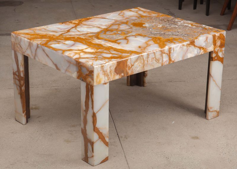 Fantastic custom side or coffee tables made of solid Onyx slabs with tan and grey veining (mined from a now defunct source) over a steel frame. 4800 each