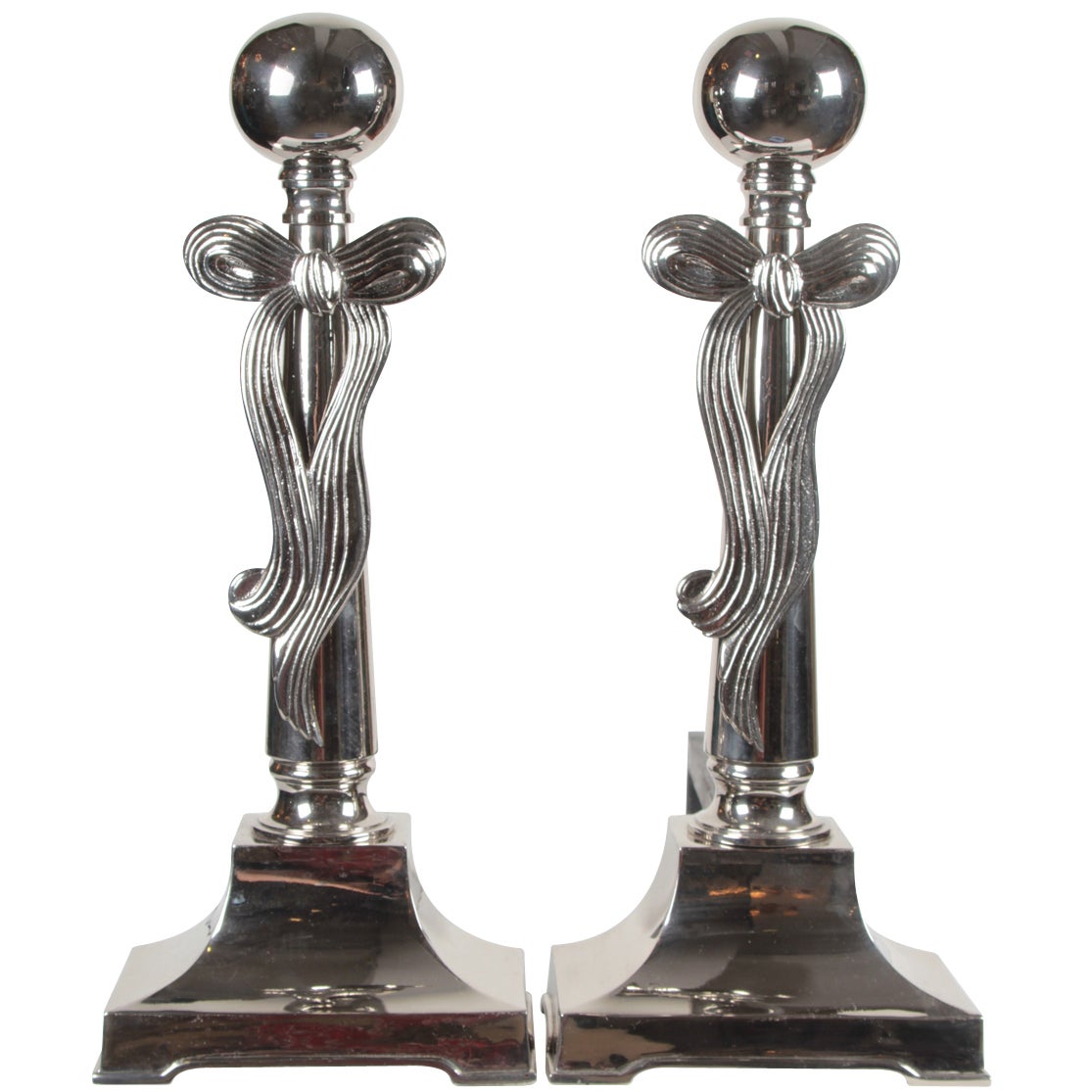 Pair of Polished Nickel Art Deco Andirons with Stylized Bow