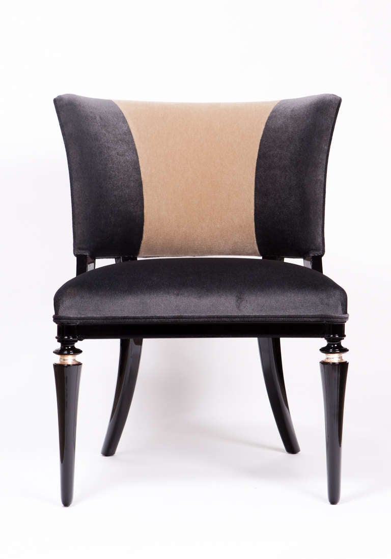 Chic pair of French Moderne Black Laquer chairs with silver leaf banding detail on the front legs and upholstered in a graphite and camel mohair combination.