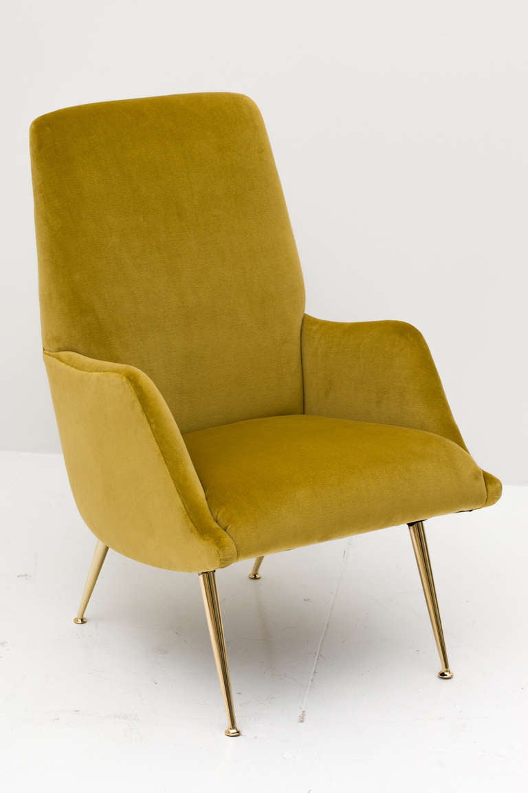 Fantastic pair of Mid-Century Italian club chairs custom upholstered in a chartreuse cotton velvet on polished brass legs.