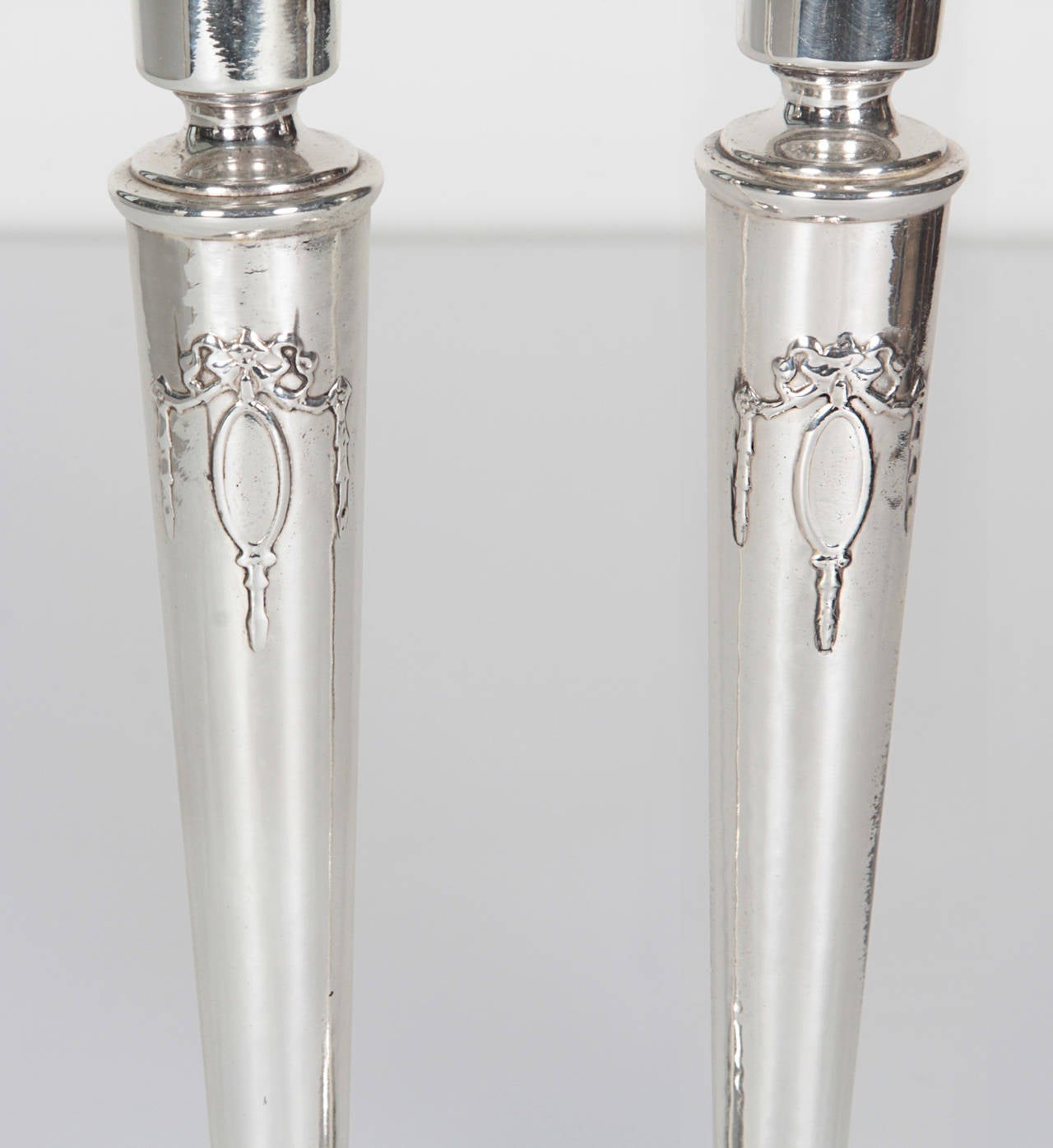 Polished Pair of English Art Deco Sterling Silver Candlesticks