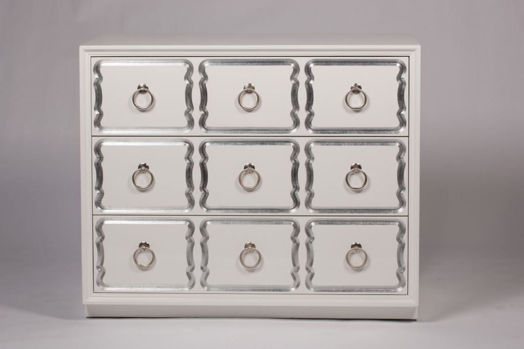 Exceptional 3 drawer chest of drawers with carved and silver leaf front and classic satin nickel ring pulls. Currently 2 available.