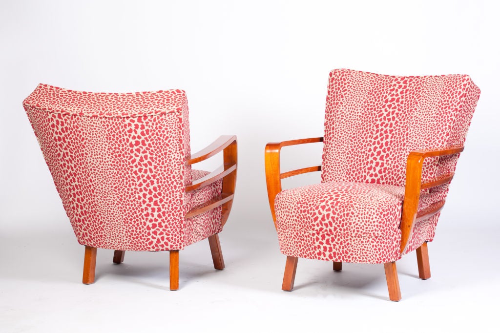 Pair of cherry framed club chairs with red stylized leopard chenille fabric. Restored condition, new upholstery and padding. This item is located at our off-site storage facility; please call to schedule a viewing.