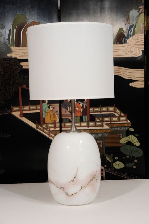 Exceptional pair of ovoid form white glass lamps with grey and violet inclusions and satin nickel elongated necks.